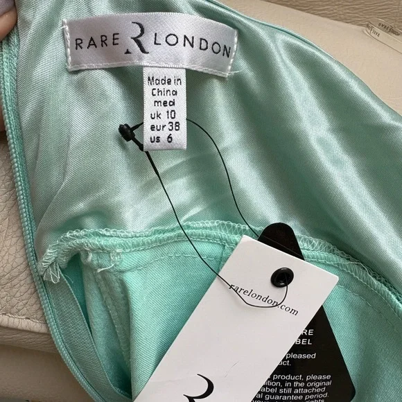 Rare London Chic Mint Green Strapless Dress with Sleek Fit - Picture 6 of 6